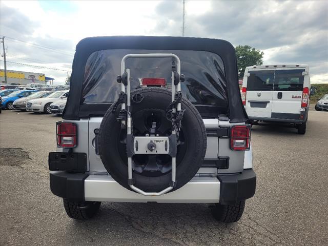 used 2014 Jeep Wrangler Unlimited car, priced at $23,990