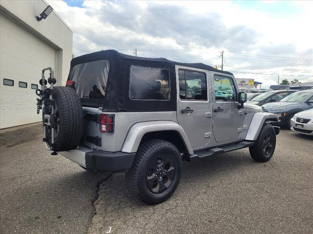 used 2014 Jeep Wrangler Unlimited car, priced at $24,990