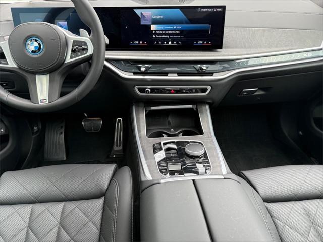 used 2025 BMW X5 PHEV car, priced at $78,888