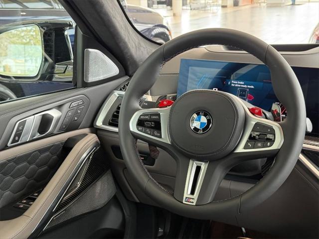 new 2025 BMW X6 M car, priced at $147,645