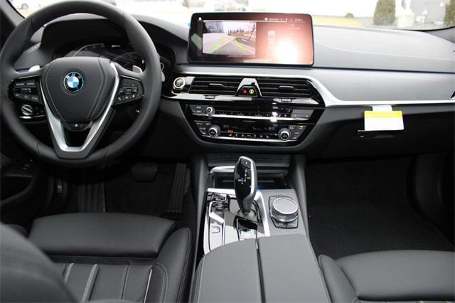 used 2023 BMW 530e car, priced at $51,904
