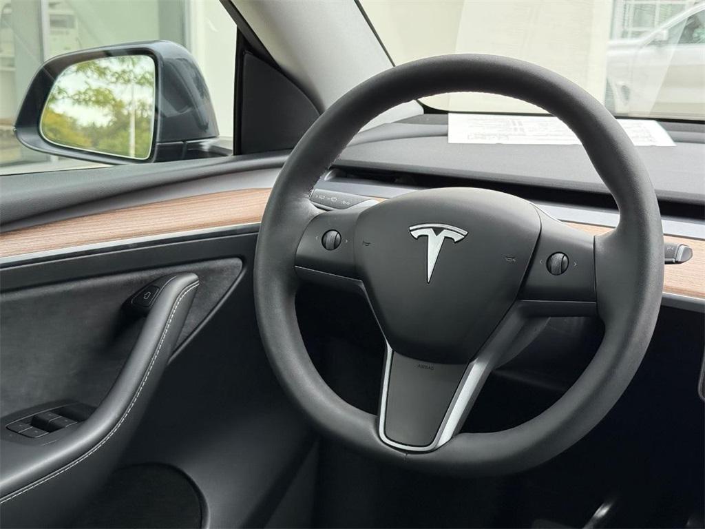 used 2023 Tesla Model Y car, priced at $32,999
