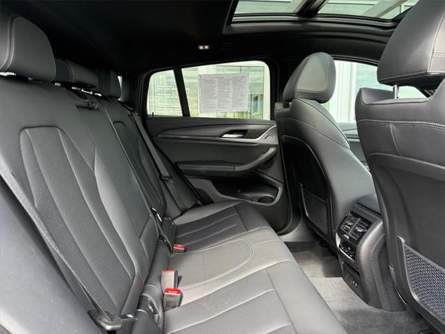 used 2022 BMW X4 car, priced at $49,901