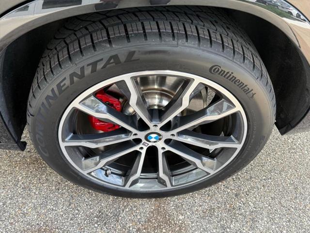 used 2022 BMW X4 car, priced at $49,901