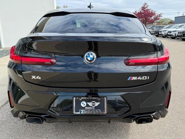 used 2022 BMW X4 car, priced at $49,901