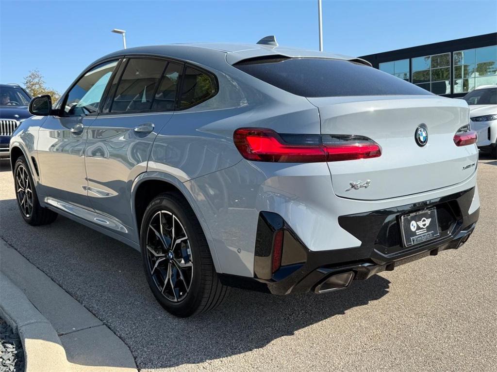 used 2025 BMW X4 car, priced at $54,499