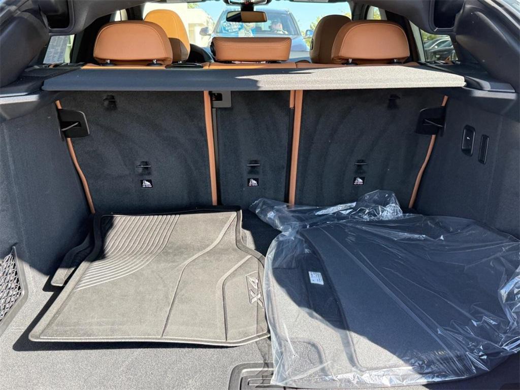 used 2025 BMW X4 car, priced at $54,499