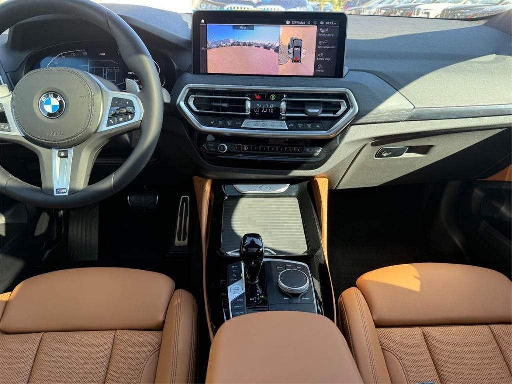 used 2025 BMW X4 car, priced at $54,499