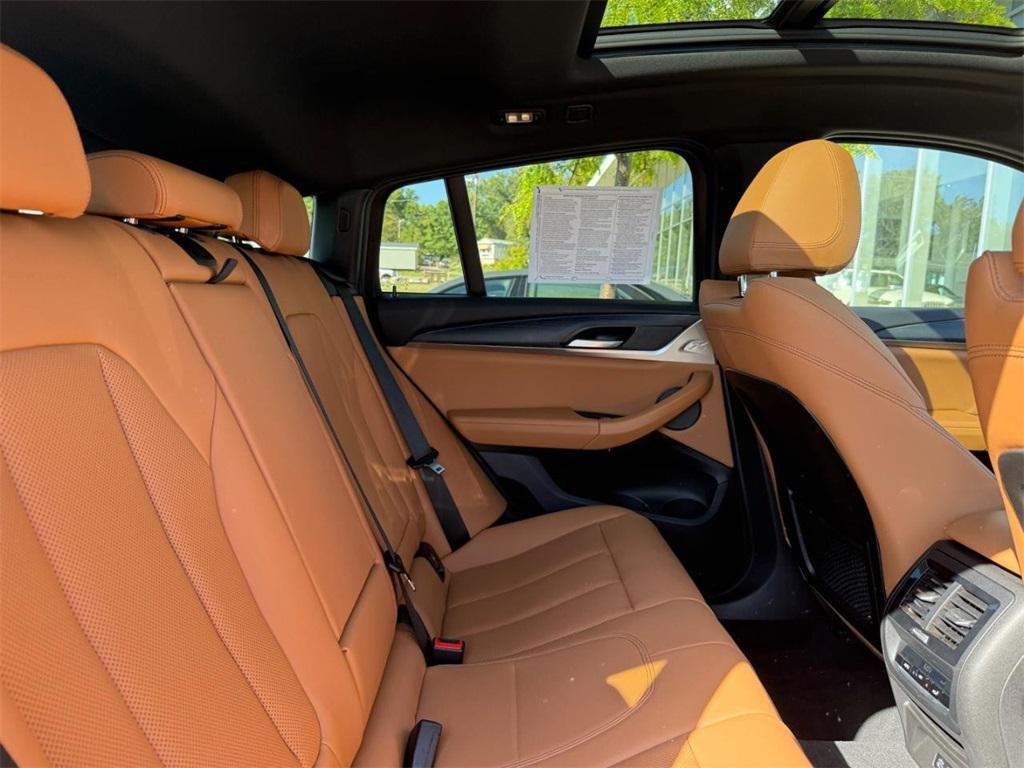used 2025 BMW X4 car, priced at $54,499