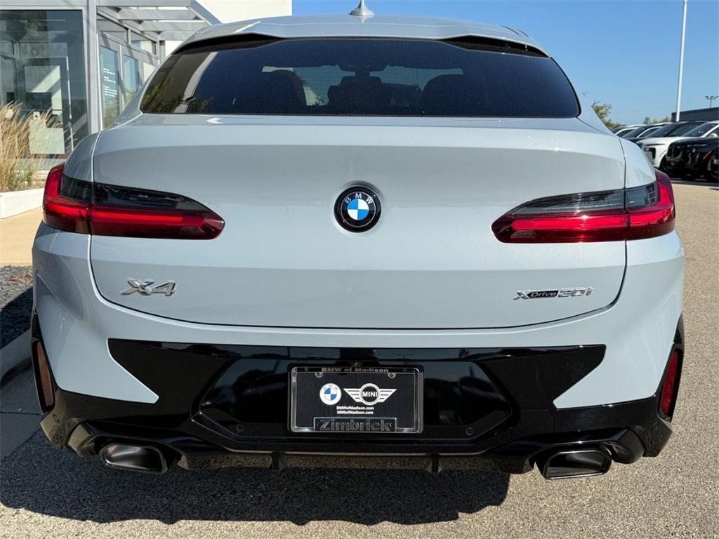 used 2025 BMW X4 car, priced at $54,499