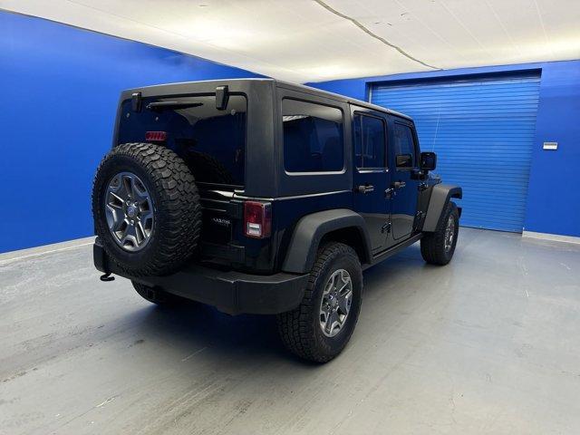 used 2015 Jeep Wrangler Unlimited car, priced at $25,260