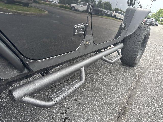 used 2014 Jeep Wrangler Unlimited car, priced at $21,455
