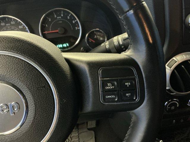 used 2013 Jeep Wrangler Unlimited car, priced at $15,730