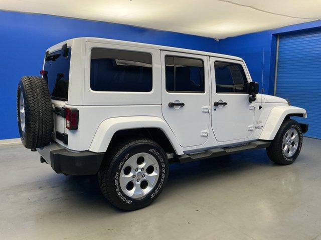 used 2013 Jeep Wrangler Unlimited car, priced at $15,730
