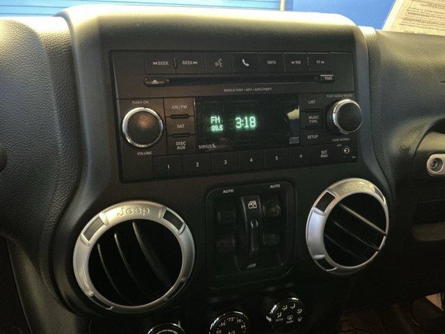 used 2013 Jeep Wrangler Unlimited car, priced at $15,730