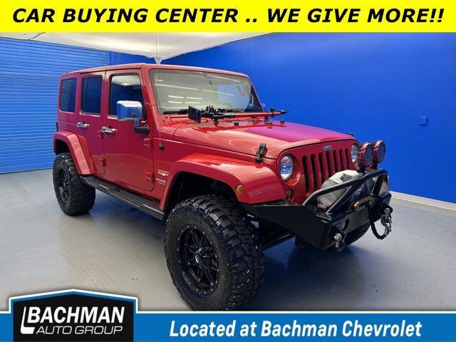 used 2012 Jeep Wrangler Unlimited car, priced at $18,410