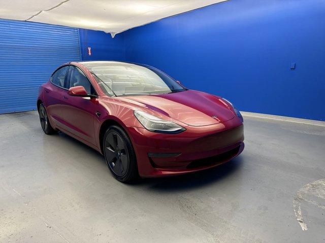 used 2023 Tesla Model 3 car, priced at $33,930