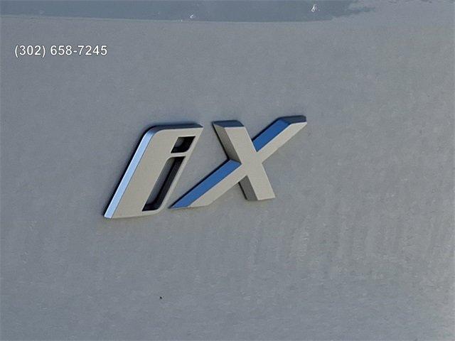 new 2026 BMW iX car, priced at $82,025