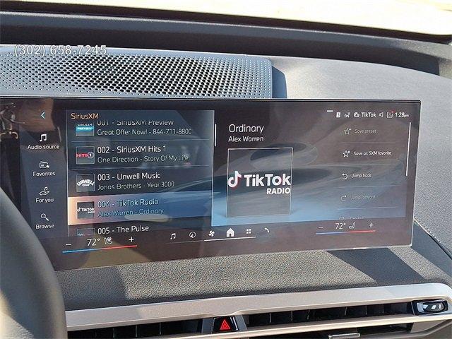 new 2026 BMW iX car, priced at $82,025