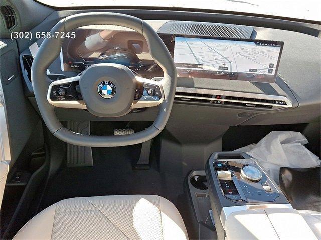 new 2026 BMW iX car, priced at $82,025