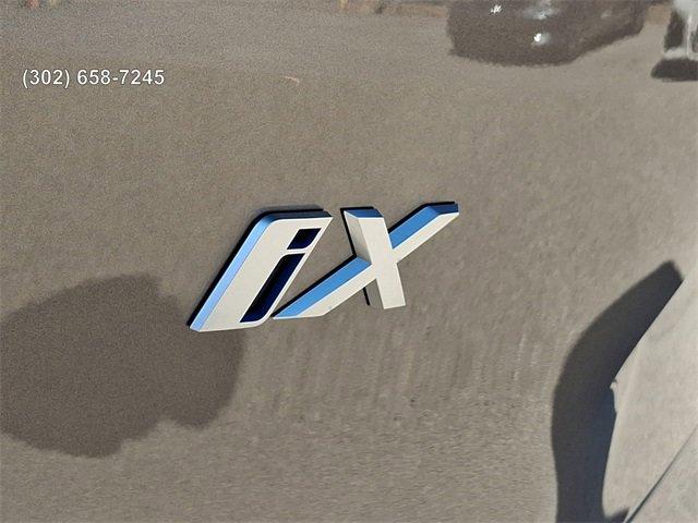 new 2025 BMW iX car, priced at $95,825