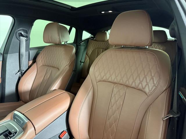 used 2023 BMW X6 car, priced at $52,821