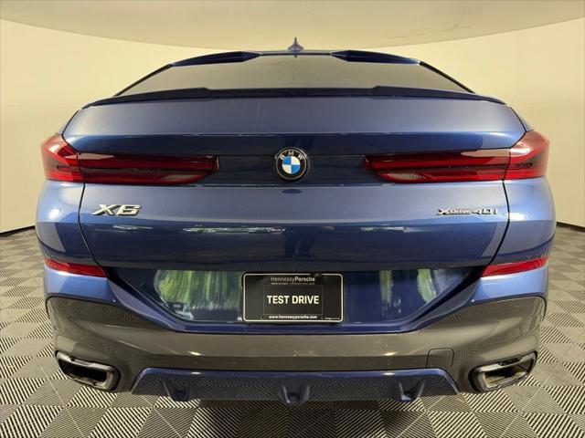 used 2023 BMW X6 car, priced at $52,821