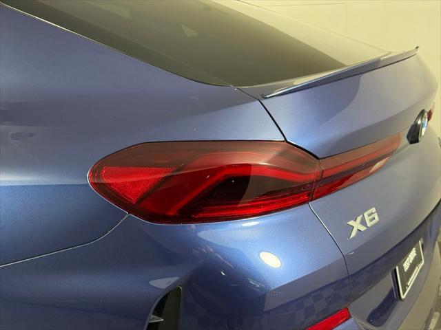 used 2023 BMW X6 car, priced at $52,821