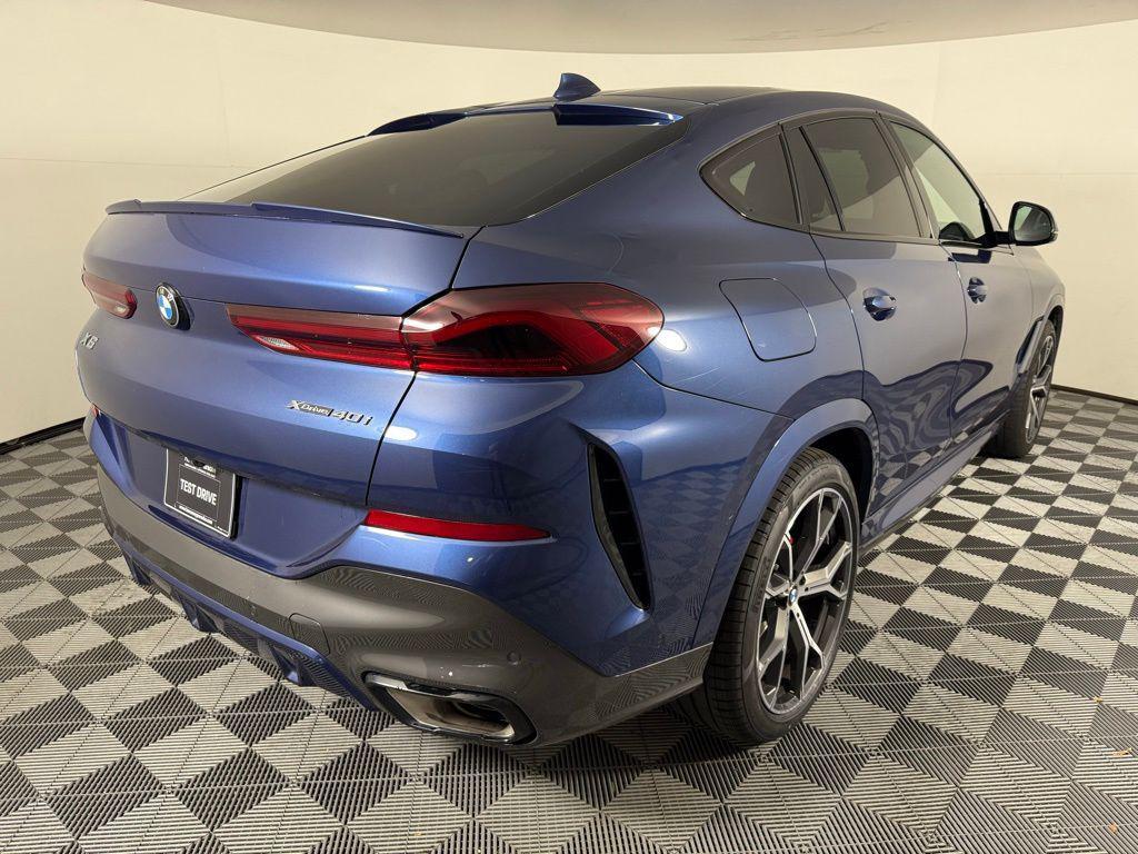 used 2023 BMW X6 car, priced at $49,424