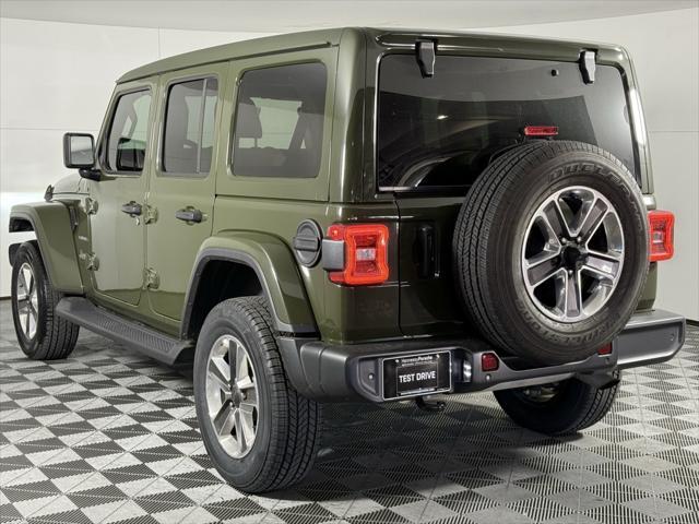 used 2021 Jeep Wrangler Unlimited car, priced at $31,875