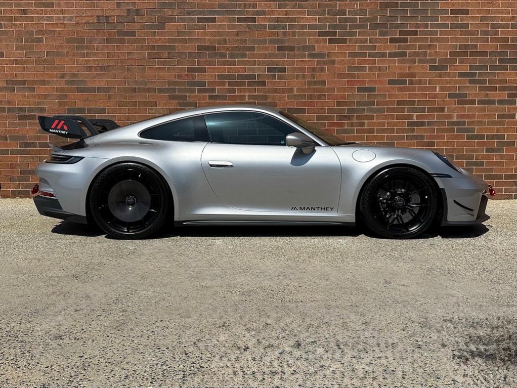 used 2023 Porsche 911 car, priced at $309,900