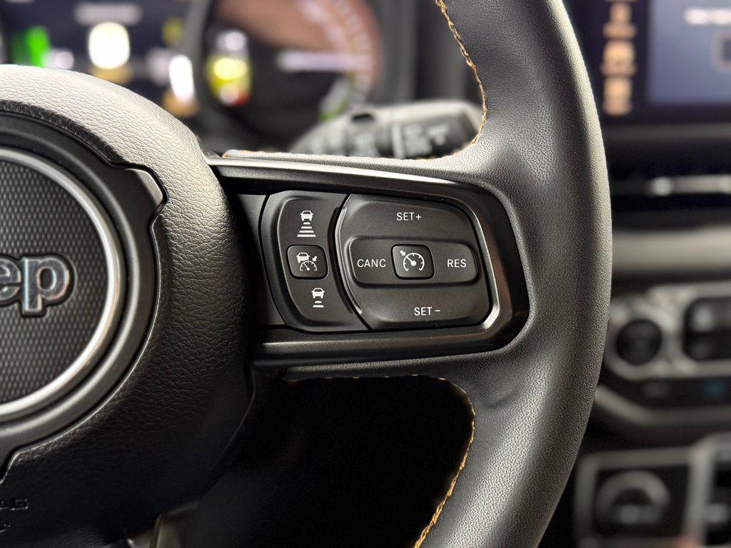 used 2024 Jeep Wrangler 4xe car, priced at $35,451