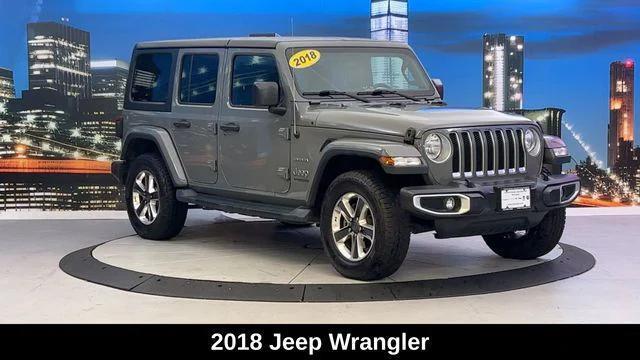 used 2018 Jeep Wrangler Unlimited car, priced at $25,736