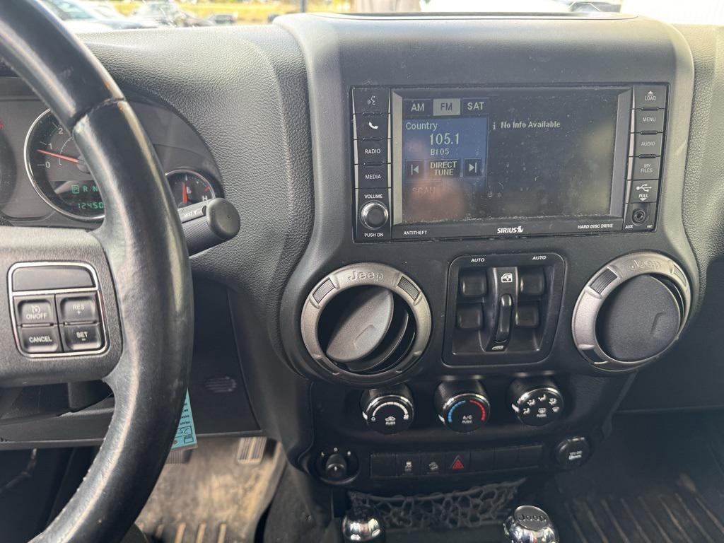 used 2013 Jeep Wrangler Unlimited car, priced at $14,988