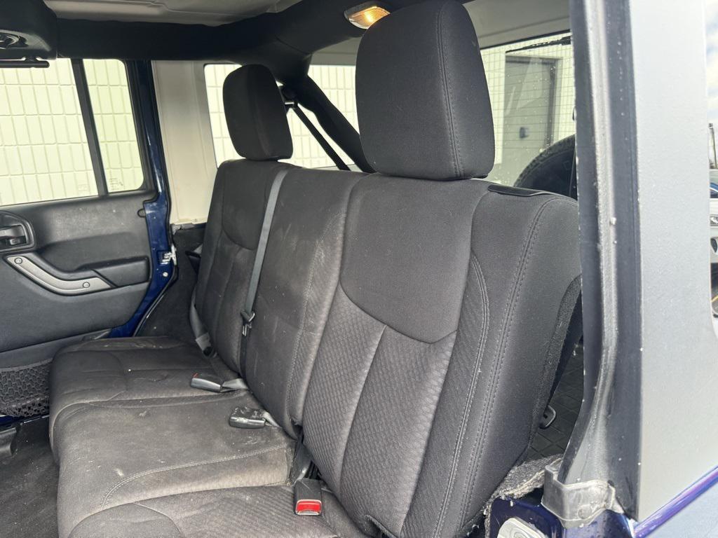 used 2013 Jeep Wrangler Unlimited car, priced at $14,988
