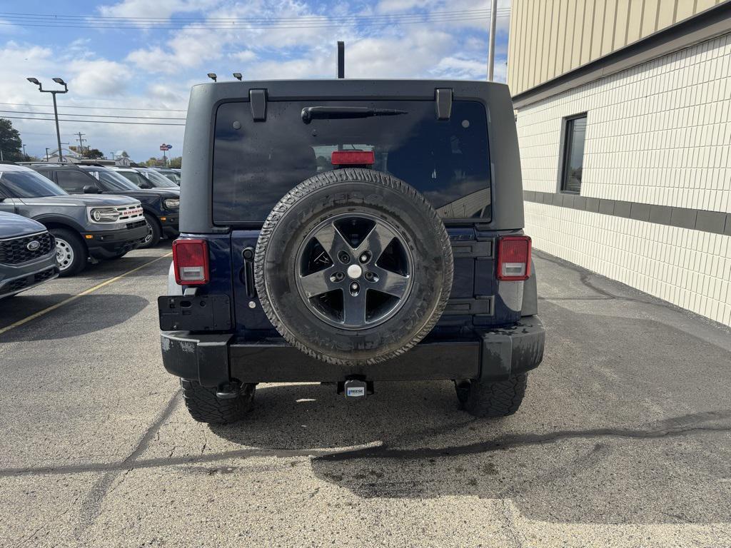 used 2013 Jeep Wrangler Unlimited car, priced at $14,988