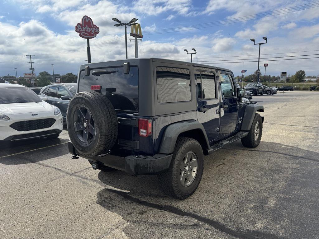 used 2013 Jeep Wrangler Unlimited car, priced at $14,988