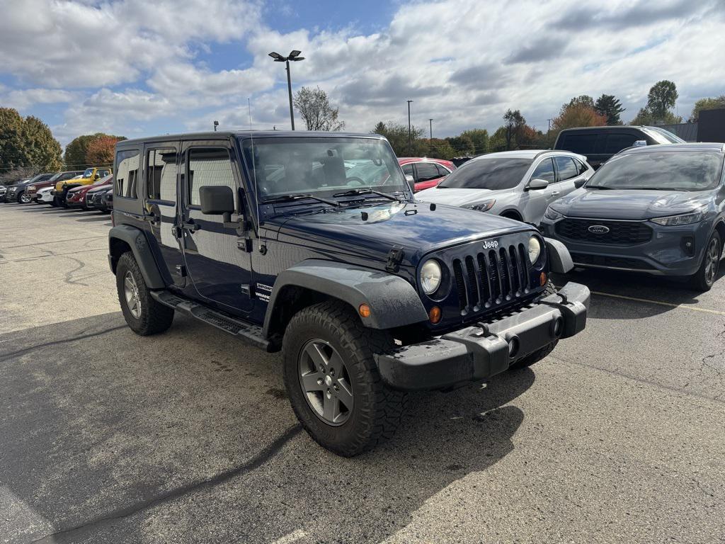 used 2013 Jeep Wrangler Unlimited car, priced at $14,988