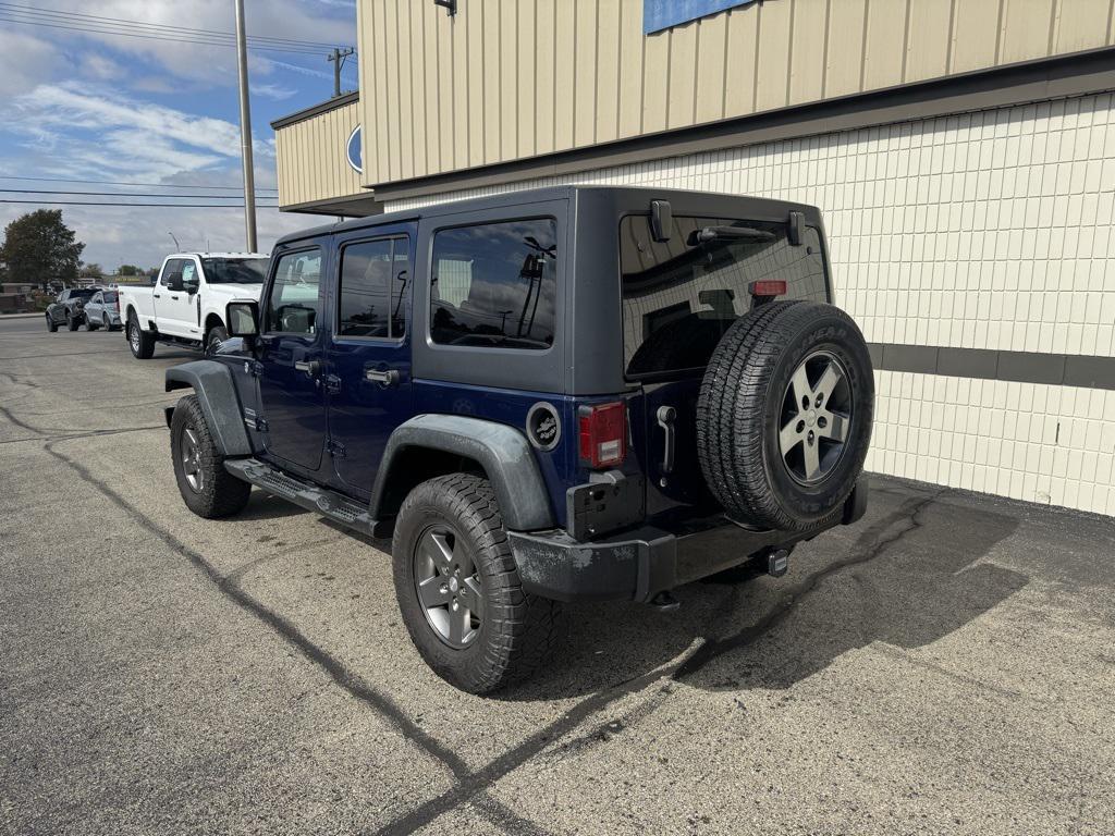 used 2013 Jeep Wrangler Unlimited car, priced at $14,988