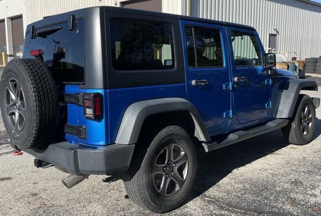 used 2015 Jeep Wrangler Unlimited car, priced at $13,485