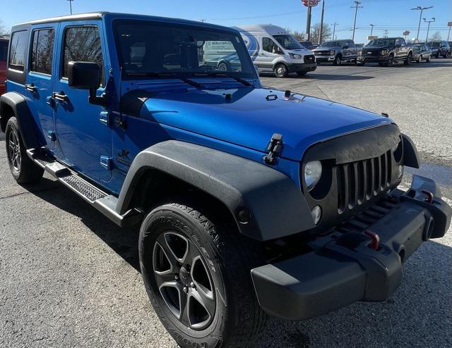 used 2015 Jeep Wrangler Unlimited car, priced at $13,485