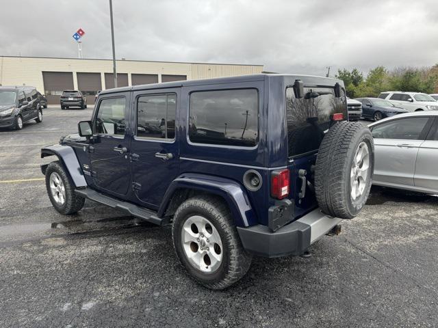 used 2013 Jeep Wrangler Unlimited car, priced at $13,225