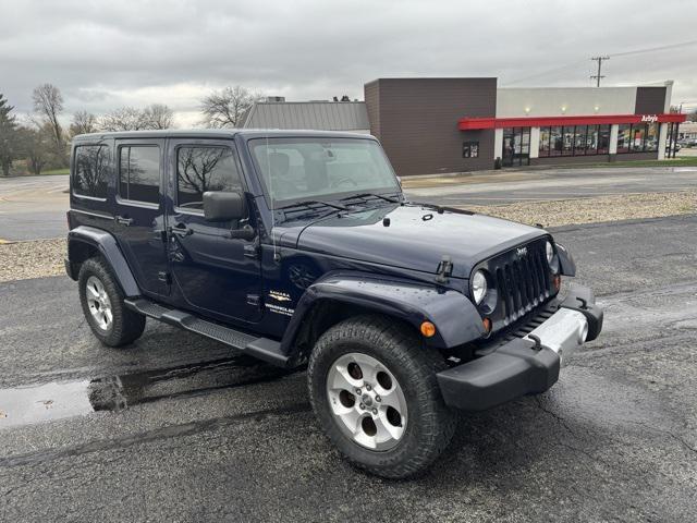 used 2013 Jeep Wrangler Unlimited car, priced at $13,225