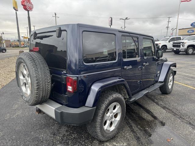 used 2013 Jeep Wrangler Unlimited car, priced at $13,225