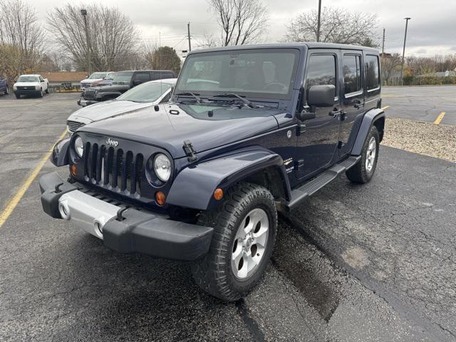 used 2013 Jeep Wrangler Unlimited car, priced at $13,225