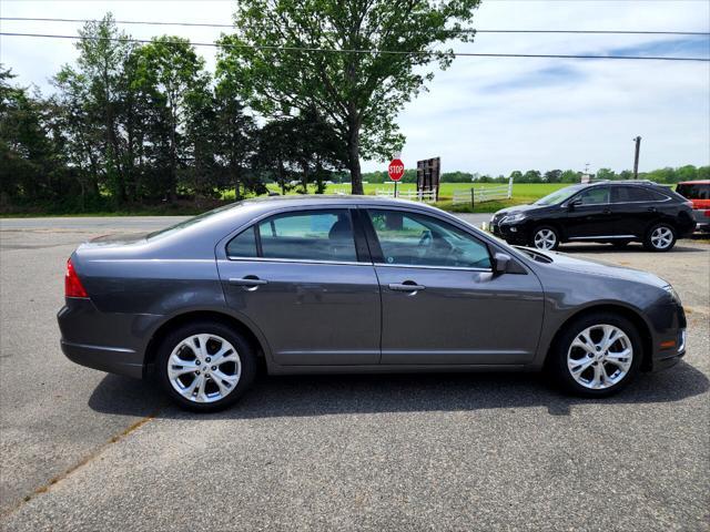 used 2012 Ford Fusion car, priced at $6,995