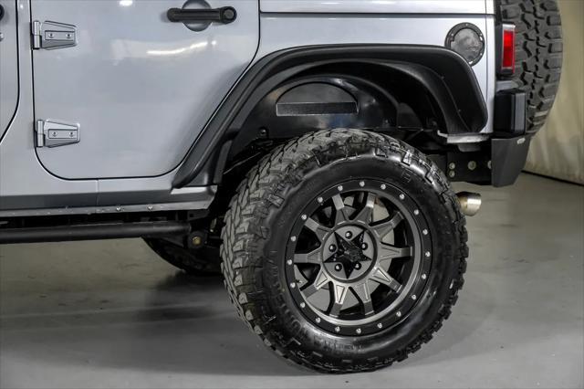 used 2015 Jeep Wrangler Unlimited car, priced at $23,995
