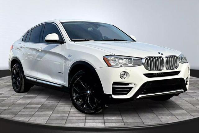 used 2016 BMW X4 car, priced at $16,495