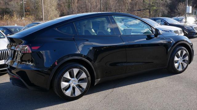 used 2023 Tesla Model Y car, priced at $35,999