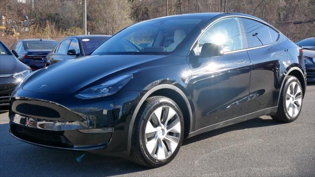 used 2023 Tesla Model Y car, priced at $35,999